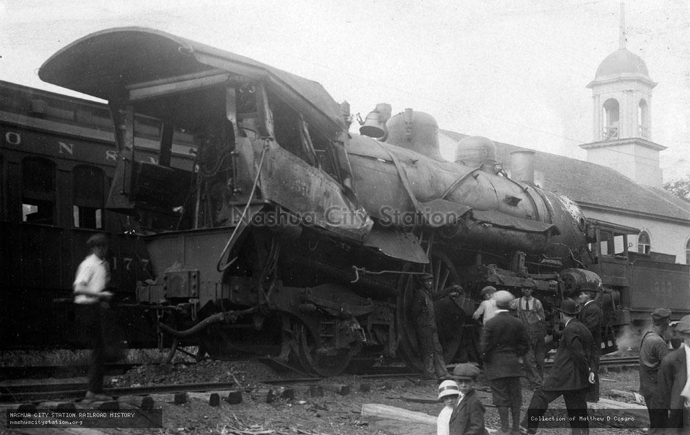 Postcard: Boston & Maine Railroad engine following a wreck at South Berwick